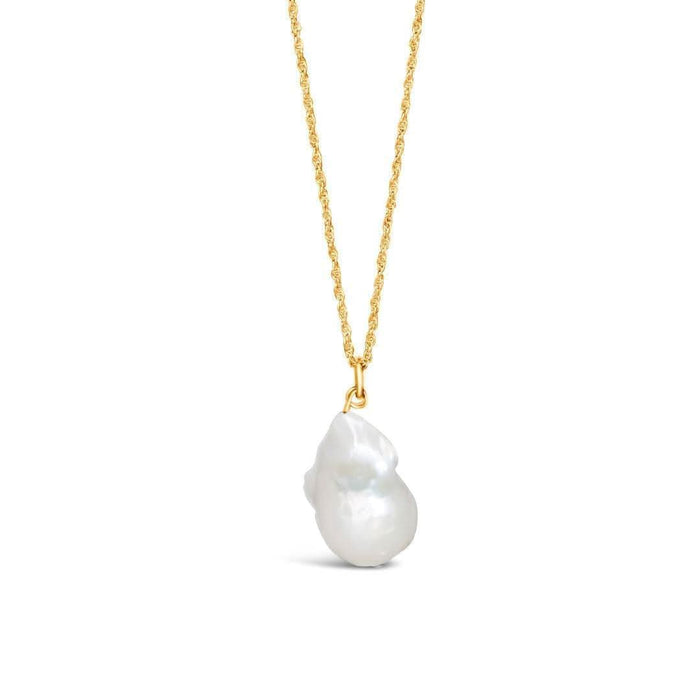 A ivory baroque pearl pendant attached to a gold vermeil chain, displayed on a plain background.