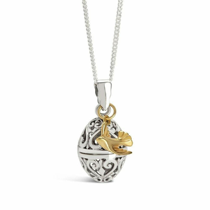 bird locket in silver with gold bird charm on a white background