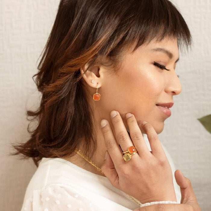 model wearing carnelian earrings in silver