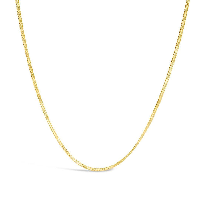 gold curb chain on a white background