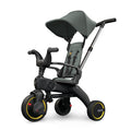 Children's tricycle with seat and canopy on a white background