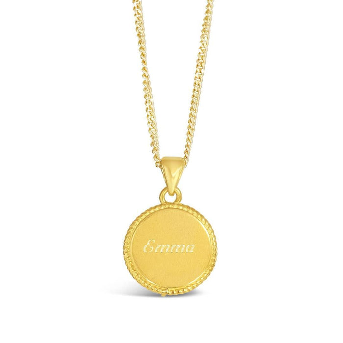 engravable disc necklace in gold on a white background