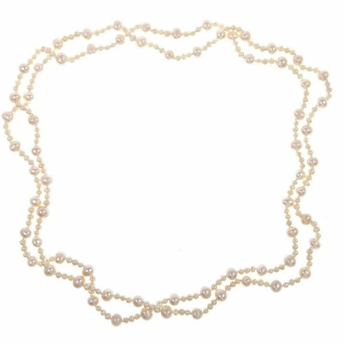 eternal pearl necklace in champagne on a white background