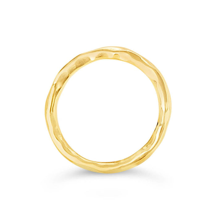 gold friendship band ring on a white background