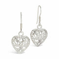 silver heart earrings on a white background