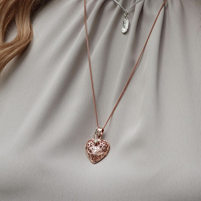 model wearing key locket in rose gold