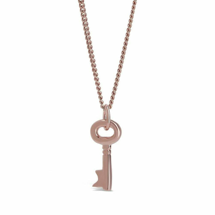 key pendant in rose gold on a white background