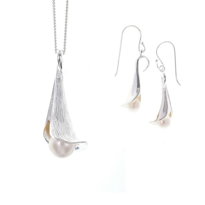 Lily necklace and earrings on a white background
