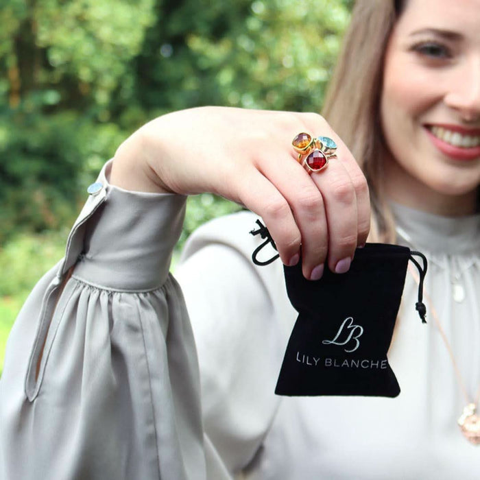 model holding Lily Blanche luxury packaging pouch