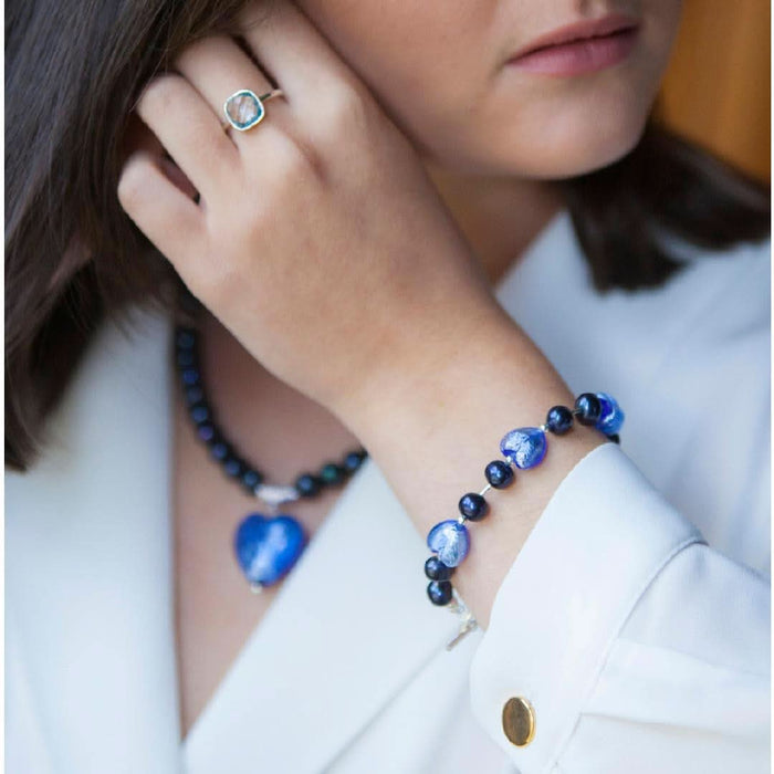 model wearing midnight pearl heart bracelet and necklace