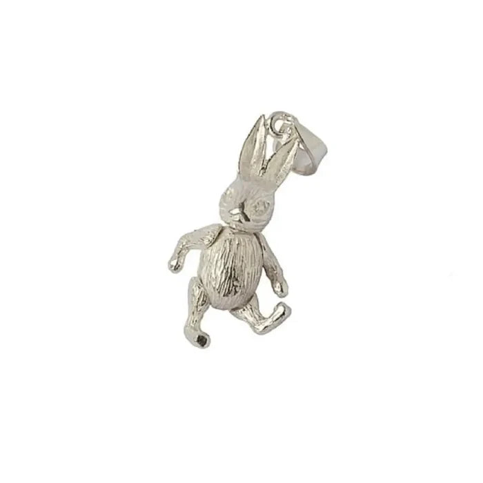 Close-up of sterling silver rabbit charm pendant showing textured bunny detail and polished finish