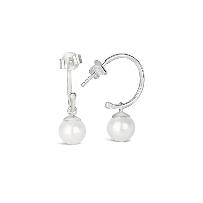 round pearl drop hoop earrings in ivory silver on a white background