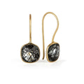 rutilated quartz earrings in gold on a white background