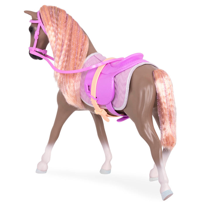 Light brown and peach horse with saddle and accessories