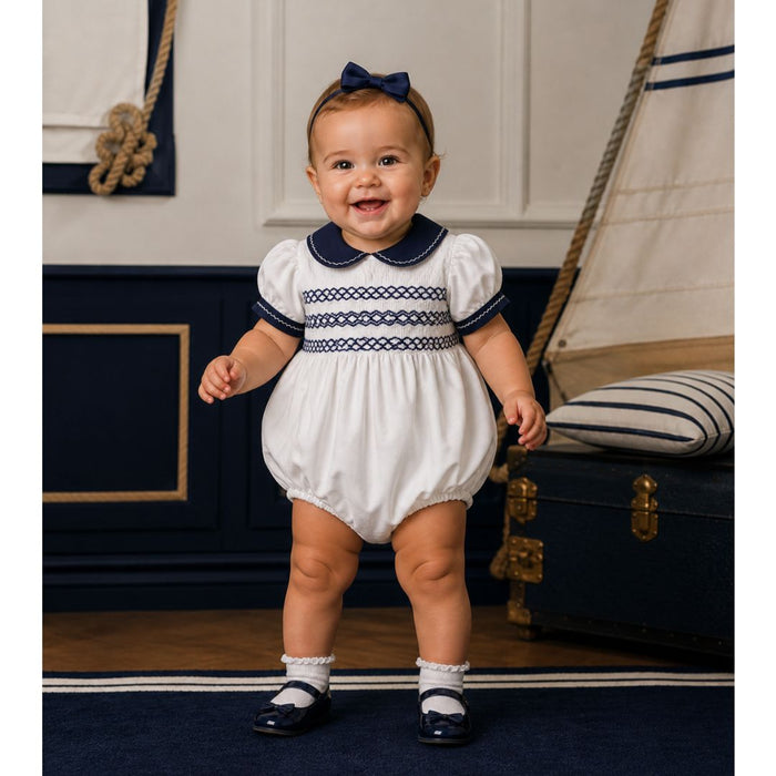 White & Navy Trim Smocked Romper